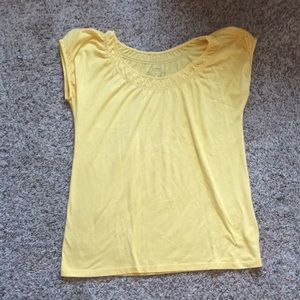 Bright yellow tee